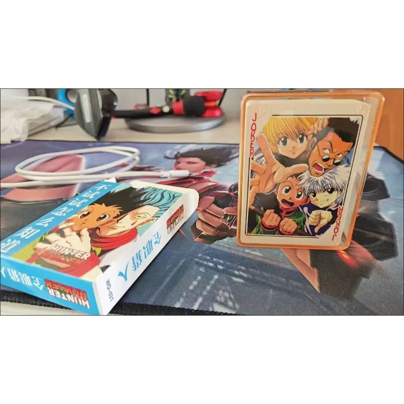 Cartes à Hunter X Hunter | Jeu de cartes à jouer illustré avec les personnages de Hunter X Hunter. Idéal pour les fans de l’anime, ce jeu de cartes est un excellent accessoire pour des moments ludiques ou comme cadeau