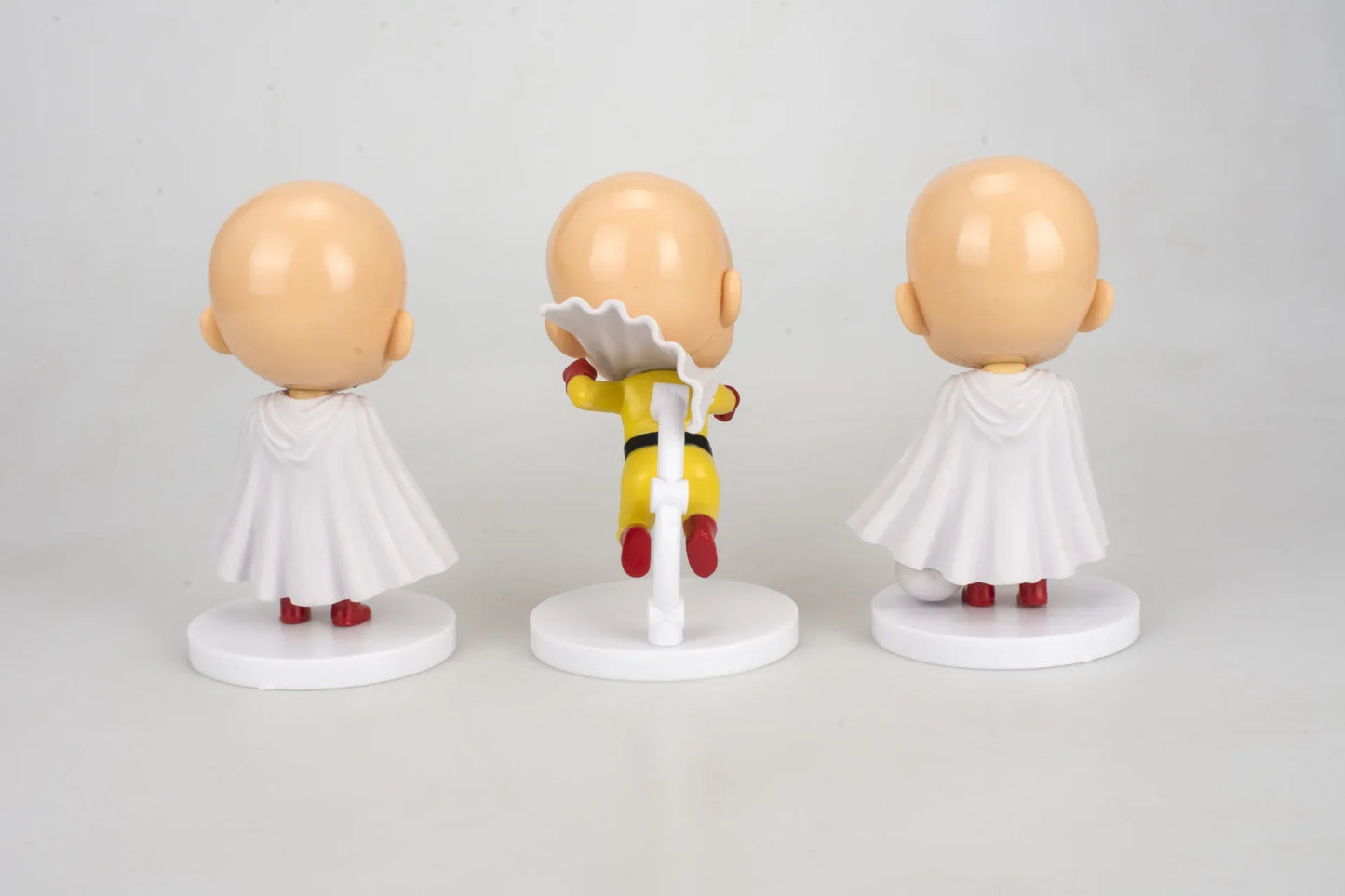 Figura One Punch Man de 10 cm | Figuras que representan a Saitama en 3 poses diferentes. Ideal para coleccionistas y fanáticos de One Punch Man. Perfecto como decoración o regalo.