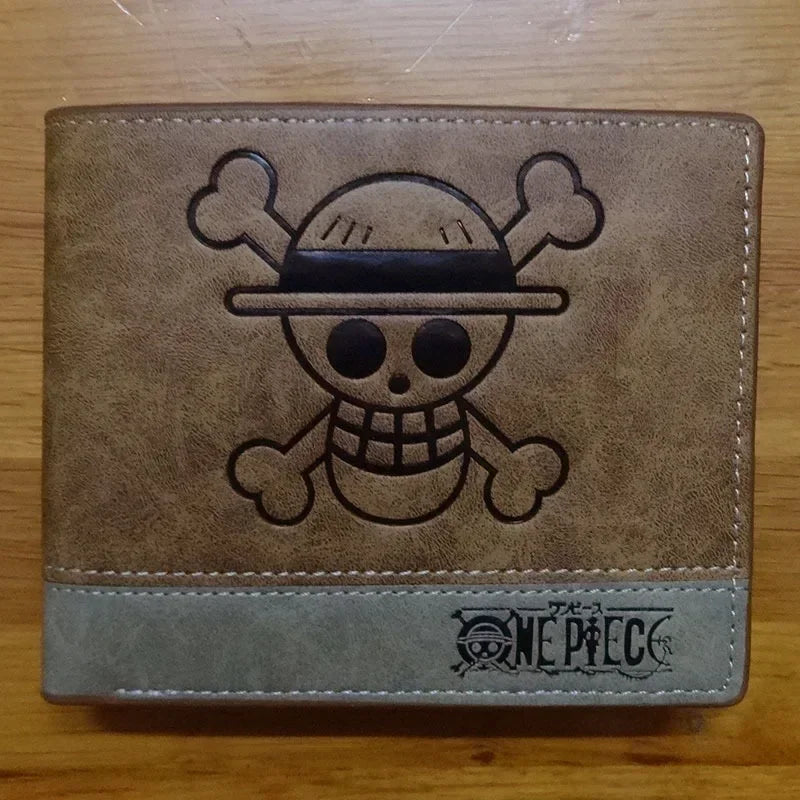 12*10cm | Cartera de piel One Piece de alta calidad, con los logos icónicos de la serie. Un accesorio elegante y funcional para los fanáticos del anime. 