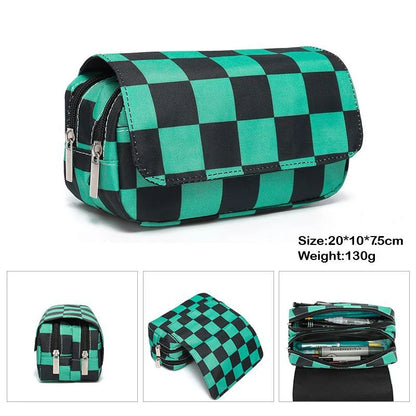 Demon Slayer canvas pencil case with double zipper, inspired by the Kimetsu No Yaiba universe. It offers a large storage space for pens, pencils, and other supplies, while adding a kawaii touch to your daily life. 