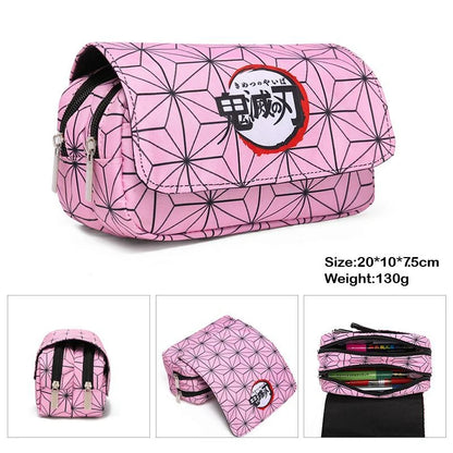 Demon Slayer canvas pencil case with double zipper, inspired by the Kimetsu No Yaiba universe. It offers a large storage space for pens, pencils, and other supplies, while adding a kawaii touch to your daily life. 