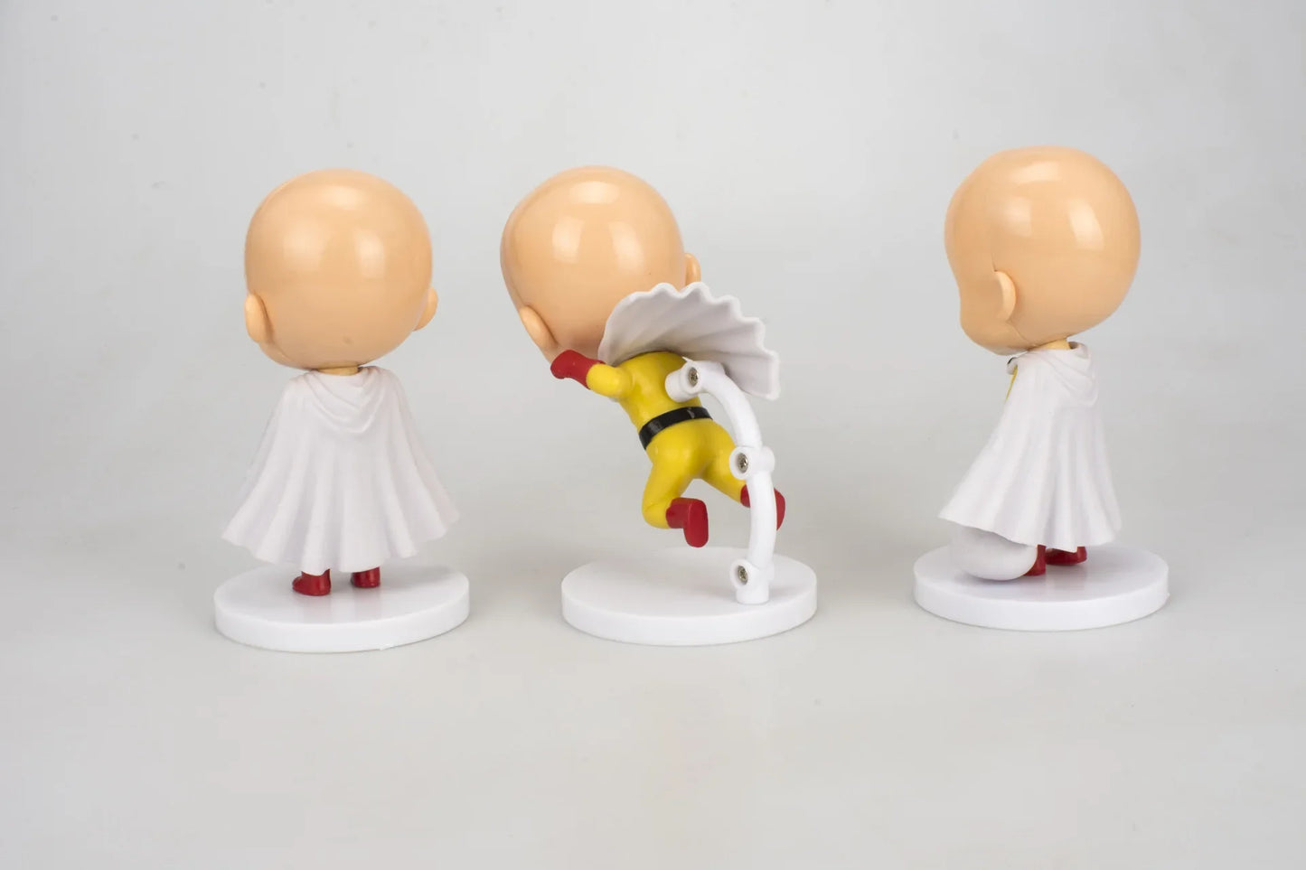 Figura One Punch Man de 10 cm | Figuras que representan a Saitama en 3 poses diferentes. Ideal para coleccionistas y fanáticos de One Punch Man. Perfecto como decoración o regalo.