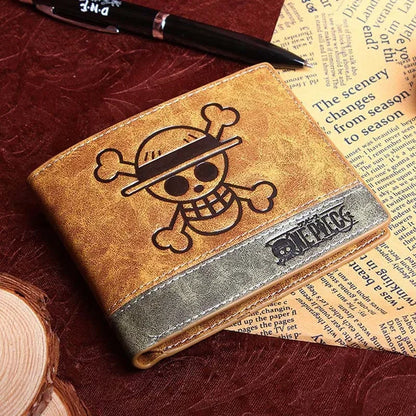 12*10cm | Cartera de piel One Piece de alta calidad, con los logos icónicos de la serie. Un accesorio elegante y funcional para los fanáticos del anime. 