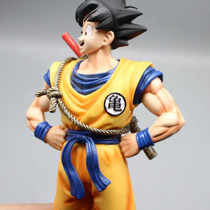Figurine de Collection Dragon Ball | Son Goku : Modèle en position debout représentant Goku avec son baton magique. Une pièce parfaite pour les fans d'Anime, idéale comme objet de collection