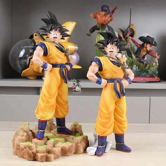Figurine de Collection Dragon Ball | Son Goku : Modèle en position debout représentant Goku avec son baton magique. Une pièce parfaite pour les fans d'Anime, idéale comme objet de collection