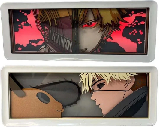 Chainsaw Man Decorative Lamp | Light box with paper cut design representing the face of Denji and Pochita. Perfect for decorating a bedroom or office, this lamp offers a unique atmosphere for manga and anime fans