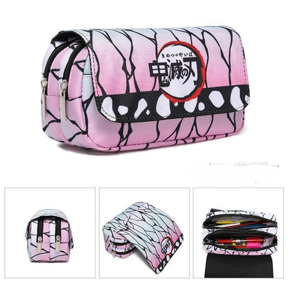 Demon Slayer canvas pencil case with double zipper, inspired by the Kimetsu No Yaiba universe. It offers a large storage space for pens, pencils, and other supplies, while adding a kawaii touch to your daily life. 